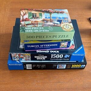 Preowned lot (4) complete puzzles